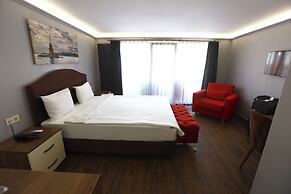 Zendy Suite Hotel
