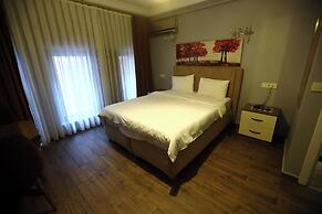 Zendy Suite Hotel