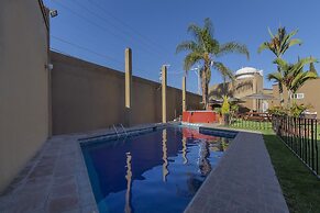 Capital O La Huerta Golf & Hotel