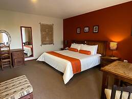 Capital O La Huerta Golf & Hotel