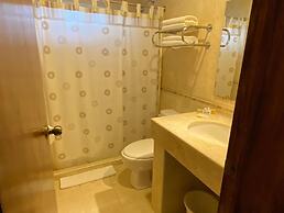 Capital O La Huerta Golf & Hotel