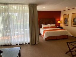 Capital O La Huerta Golf & Hotel