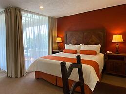 Capital O La Huerta Golf & Hotel