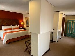 Capital O La Huerta Golf & Hotel