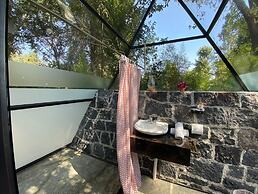 Capital O La Huerta Golf & Hotel