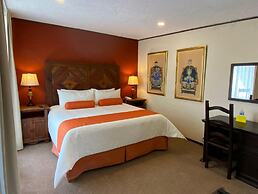 Capital O La Huerta Golf & Hotel