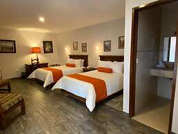 Capital O La Huerta Golf & Hotel