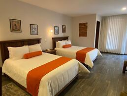 Capital O La Huerta Golf & Hotel