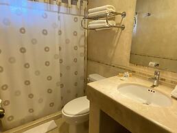 Capital O La Huerta Golf & Hotel