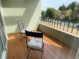 Capital O La Huerta Golf & Hotel