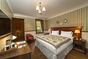 The Whispering Pine Lodge