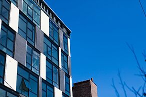 Dharma Home Suites Hoboken at Novia