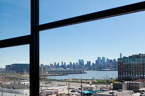 Dharma Home Suites Hoboken at Novia