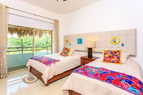 Condos Perfectly Situated Between the Beach & Tulum Town by Stella Ren