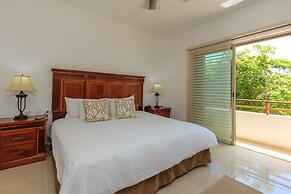 Condos Perfectly Situated Between the Beach & Tulum Town by Stella Ren