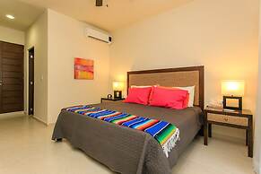 Condos Perfectly Situated Between the Beach & Tulum Town by Stella Ren