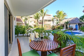 Condos Perfectly Situated Between the Beach & Tulum Town by Stella Ren