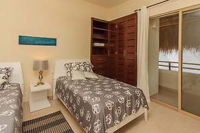 Condos Perfectly Situated Between the Beach & Tulum Town by Stella Ren