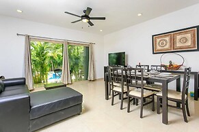 Condos Perfectly Situated Between the Beach & Tulum Town by Stella Ren