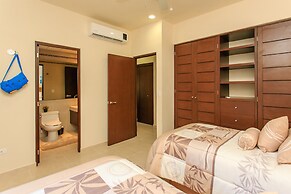 Condos Perfectly Situated Between the Beach & Tulum Town by Stella Ren