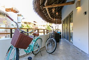 Condos Perfectly Situated Between the Beach & Tulum Town by Stella Ren