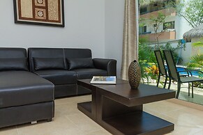 Condos Perfectly Situated Between the Beach & Tulum Town by Stella Ren
