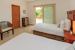 Condos Perfectly Situated Between the Beach & Tulum Town by Stella Ren