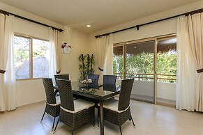 Condos Perfectly Situated Between the Beach & Tulum Town by Stella Ren