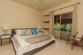 Condos Perfectly Situated Between the Beach & Tulum Town by Stella Ren