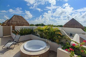 Condos Perfectly Situated Between the Beach & Tulum Town by Stella Ren