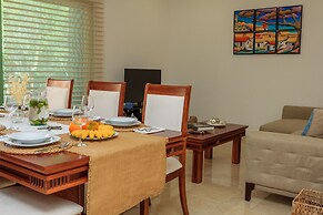 Condos Perfectly Situated Between the Beach & Tulum Town by Stella Ren