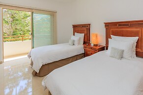 Condos Perfectly Situated Between the Beach & Tulum Town by Stella Ren