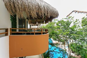 Condos Perfectly Situated Between the Beach & Tulum Town by Stella Ren