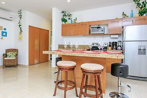 Condos Perfectly Situated Between the Beach & Tulum Town by Stella Ren