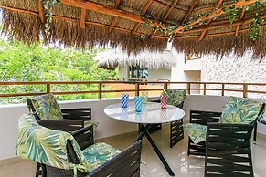 Condos Perfectly Situated Between the Beach & Tulum Town by Stella Ren