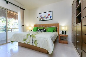 Condos Perfectly Situated Between the Beach & Tulum Town by Stella Ren
