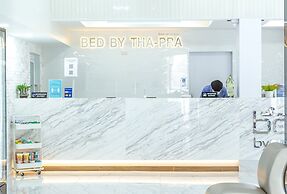 Bed by Tha-Pra Hotel and Apartment