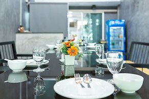 Bed by Tha-Pra Hotel and Apartment