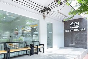 Bed by Tha-Pra Hotel and Apartment