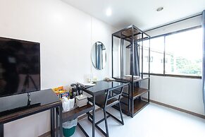 Bed by Tha-Pra Hotel and Apartment