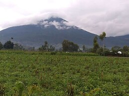 The Den Soroti Green