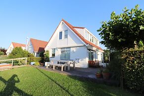Nice Holiday Home on the Water in Grou