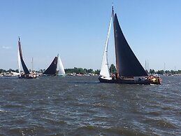 Nice Holiday Home on the Water in Grou