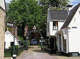 Nice Holiday Home on the Water in Grou