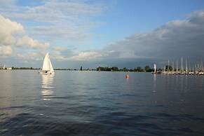 Nice Holiday Home on the Water in Grou