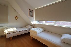 Nice Holiday Home on the Water in Grou