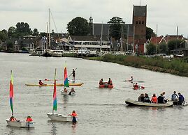 Nice Holiday Home on the Water in Grou