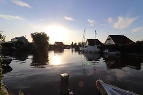 Nice Holiday Home on the Water in Grou