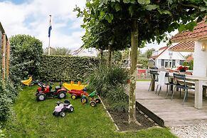 Nice Holiday Home on the Water in Grou
