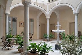 Raíces Alameda Casa Palacio